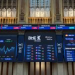 El Ibex 35 frena ante los 20.000 puntos pendiente de los resultados